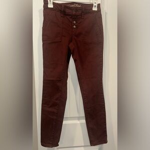 Skinny high waisted style slacks, maroon with 4 buttons up front
